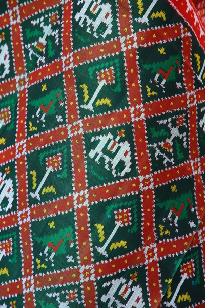 Semi double ikat dupatta in traditiona Hathi Popat design in Green and Red colour