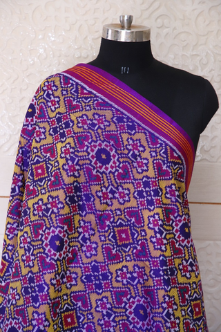 Semi double ikat dupatta in Yellow and Purple colour with traditional navratna and manekchowk design