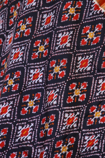 Single ikat dupatta in traditional Paan Chanda design in Black and Orange combination