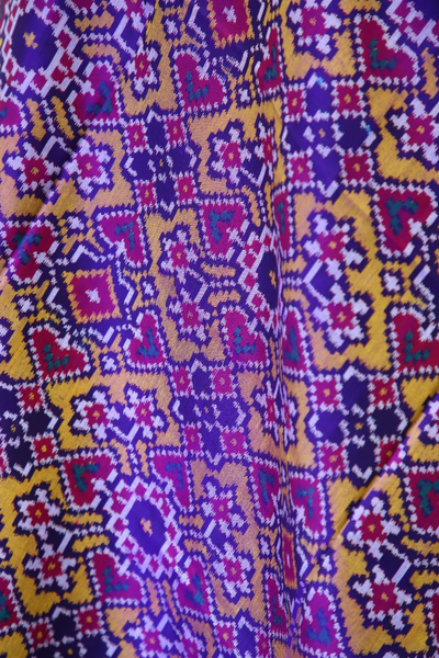 Semi double ikat dupatta in Yellow and Purple colour with traditional navratna and manekchowk design