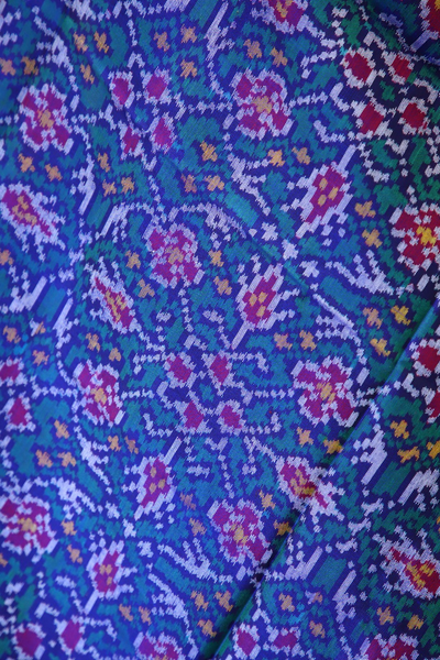 Semi double ikat dupatta in Purple and Green colour with traditional chhabadi bhat design