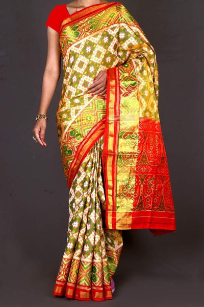 Red Pallu off white with green Patola Saree