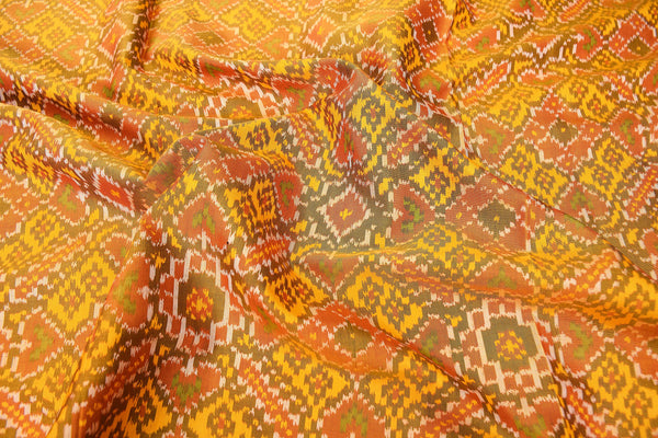 Patola saree in red,green and yellow combination