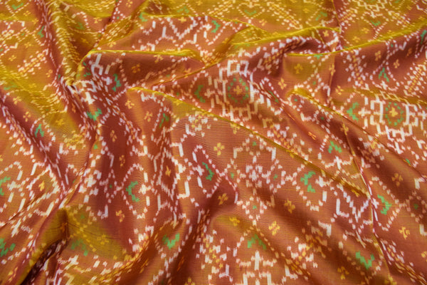 patola saree in red and golden colour