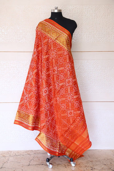 Traditional Navratna Manekchowk mix design in orange and red combination