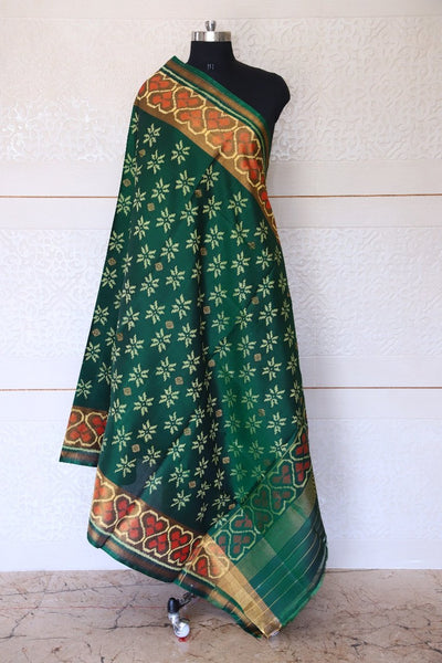 Traditional design with zaributta in Green colour