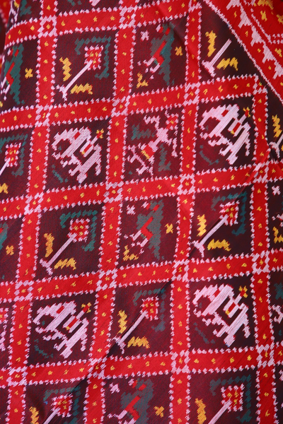 Semi double ikat dupatta in traditional Hathi Popat design in red and brown colour