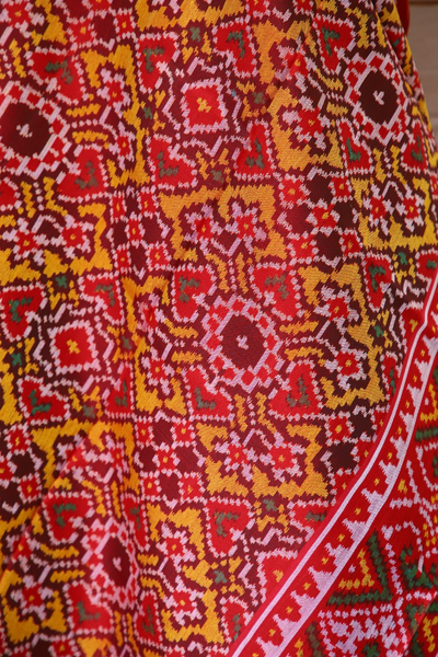 Semi double ikat dupatta in Yellow and Red colour with traditional Navratna and Manekchowk mix design