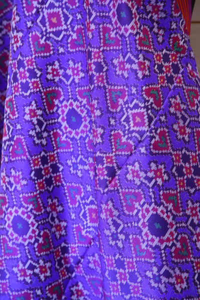 Semi double ikat dupatta in traditional Manekchowk and Navratna design with Purple and Pink colour