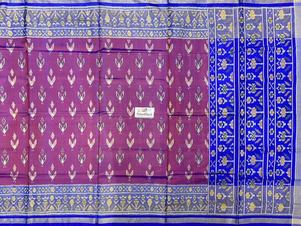 Magenta and blue leaf Design pallu Patola saree